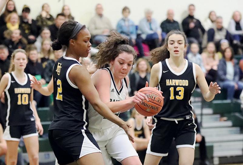 Ella Gannon defends Stowe forward at recent game.  Harwood won 51-10